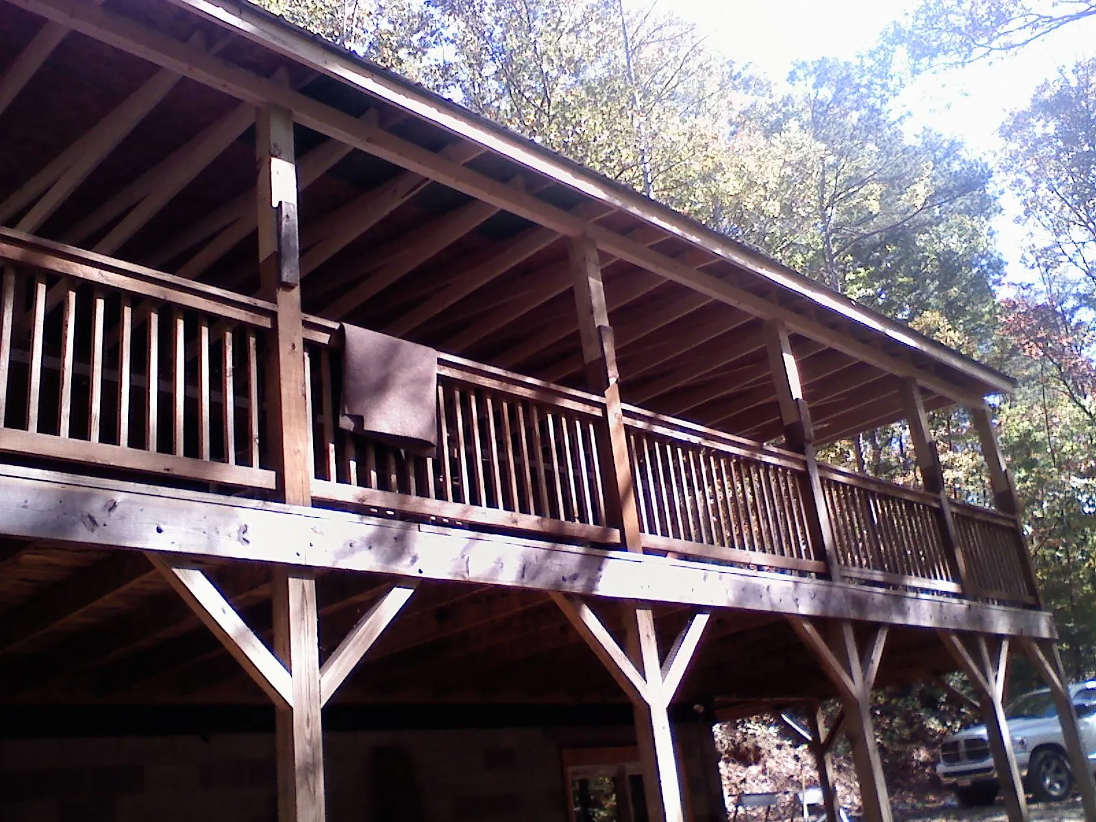 Timber framing under a new elevated porch and deck — Roof Leak Repair in Tiffin by Roofing Brothers